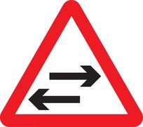 Two-way traffic crosses one-way road